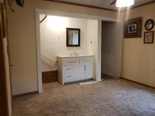 14452 Ns 3630th Rd, Sasakwa, OK 74867 - unfurnished bedroom with carpet, a sink, baseboards, and ornamental molding