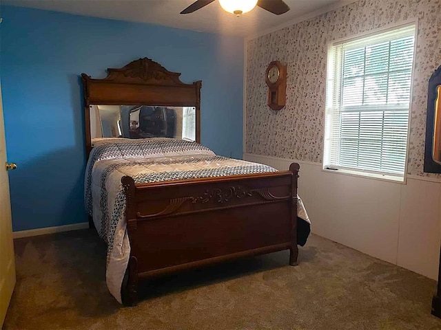 14452 Ns 3630th Rd, Sasakwa, OK 74867 - carpeted bedroom featuring wallpapered walls, wainscoting, and a ceiling fan