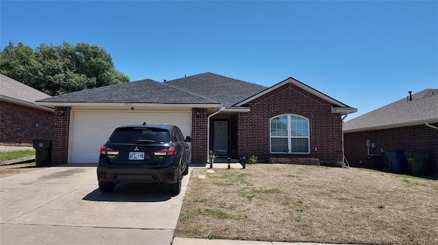 2338 Serenade Dr, Midwest City, OK 73130 - single story home featuring brick siding, an attached garage, driveway, a shingled roof, and a front yard