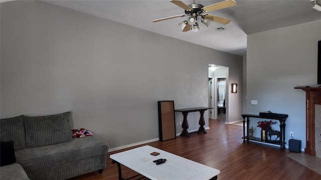 2338 Serenade Dr, Midwest City, OK 73130 - living room with ceiling fan, wood finished floors, and baseboards