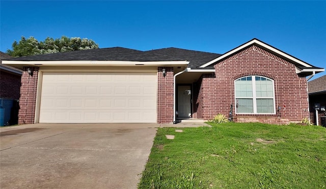 2338 Serenade Dr, Midwest City, OK 73130 - single story home with brick siding, driveway, a front lawn, and a garage