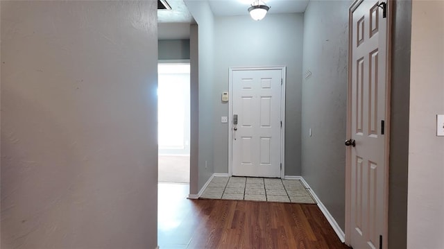 2338 Serenade Dr, Midwest City, OK 73130 - doorway with wood finished floors and baseboards