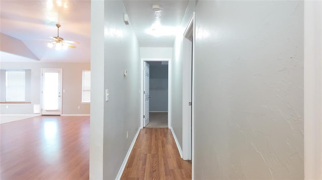 2338 Serenade Dr, Midwest City, OK 73130 - hall featuring wood finished floors and lofted ceiling