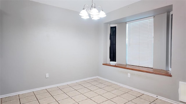 2338 Serenade Dr, Midwest City, OK 73130 - empty room with a chandelier and light tile patterned flooring