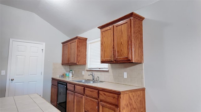 2338 Serenade Dr, Midwest City, OK 73130 - kitchen featuring black dishwasher, tile counters, backsplash, lofted ceiling, and brown cabinets