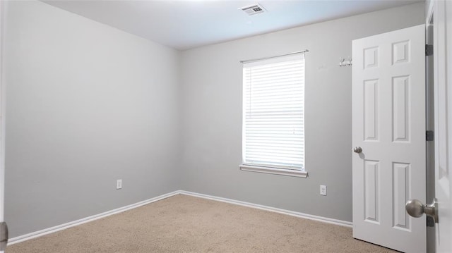 2338 Serenade Dr, Midwest City, OK 73130 - carpeted spare room with baseboards