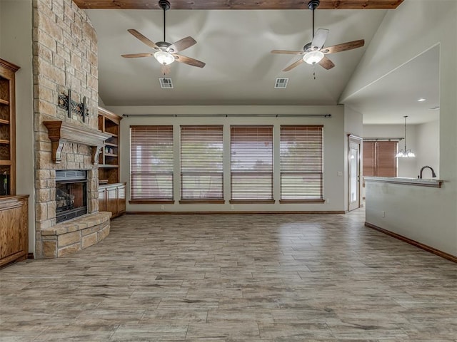 1960 Bermuda Dr, Newcastle, OK 73065 - unfurnished living room with a ceiling fan, plenty of natural light, a fireplace, and high vaulted ceiling