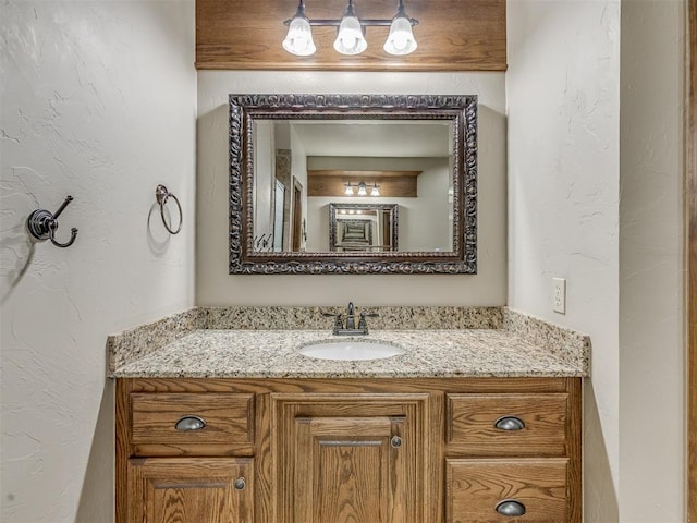 1960 Bermuda Dr, Newcastle, OK 73065 - bathroom with vanity and a textured wall