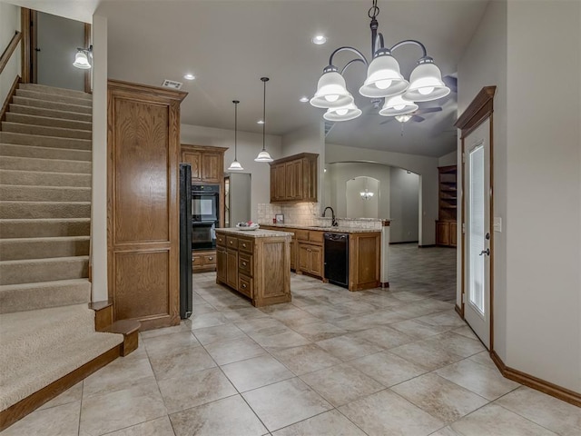 1960 Bermuda Dr, Newcastle, OK 73065 - kitchen with a chandelier, dishwasher, arched walkways, brown cabinets, and recessed lighting