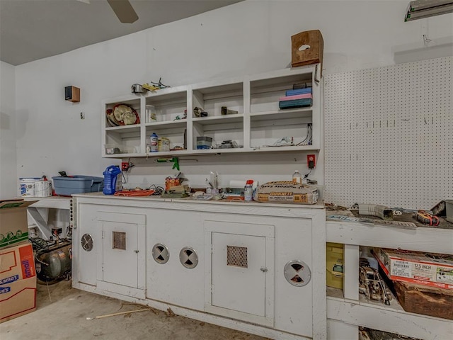 1960 Bermuda Dr, Newcastle, OK 73065 - kitchen featuring concrete floors, a ceiling fan, open shelves, and light countertops