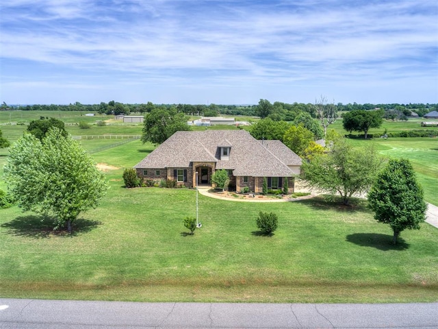 1960 Bermuda Dr, Newcastle, OK 73065 - french country inspired facade with a front lawn, a shingled roof, and brick siding