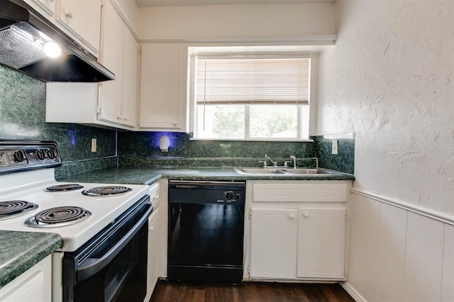 kitchen with range with electric cooktop, black dishwasher, under cabinet range hood, a sink, and dark countertops