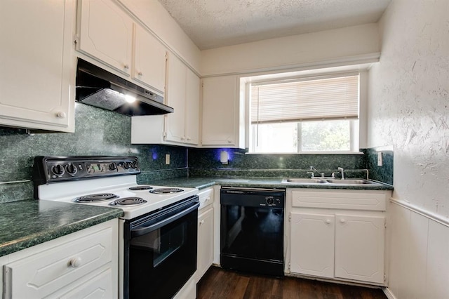 kitchen featuring dishwasher, electric range, under cabinet range hood, a sink, and dark countertops