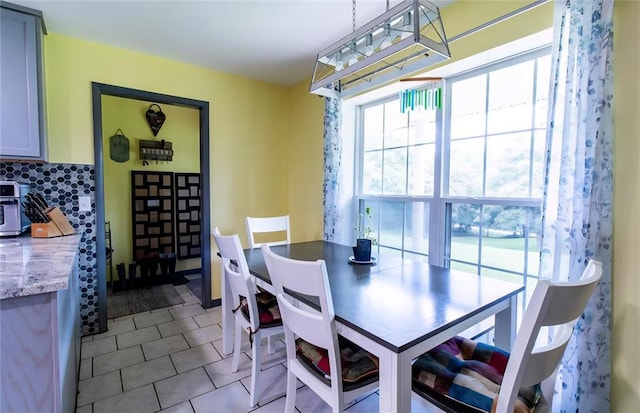 330917 E 940th Rd, Wellston, OK 74881 - dining space featuring light tile patterned floors