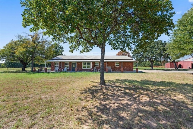 20302 Kings Rd, Shawnee, OK 74801 - ranch-style home with brick siding and a front lawn