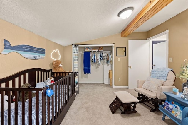 20302 Kings Rd, Shawnee, OK 74801 - carpeted bedroom with lofted ceiling, a textured ceiling, and a closet