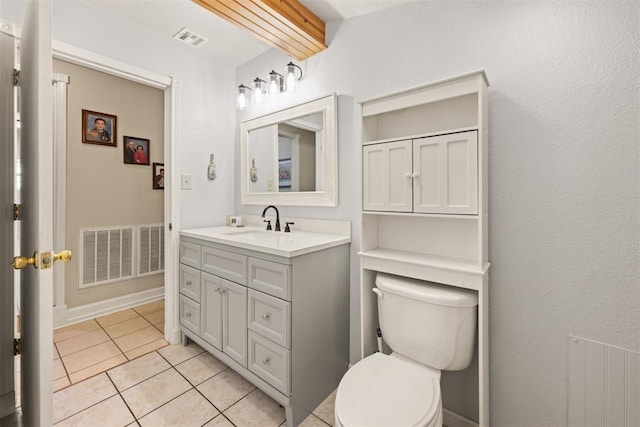 20302 Kings Rd, Shawnee, OK 74801 - bathroom featuring vanity, tile patterned floors, and toilet