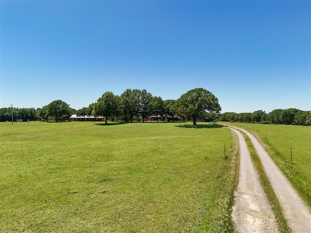 20302 Kings Rd, Shawnee, OK 74801 - surrounding community featuring a lawn, driveway, and a rural view