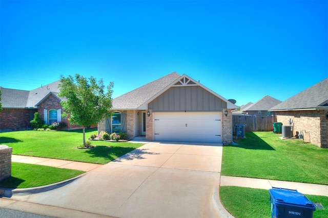 4108 NW 154th St, Edmond, OK 73013 - ranch-style home featuring board and batten siding, cooling unit, a garage, driveway, and brick siding