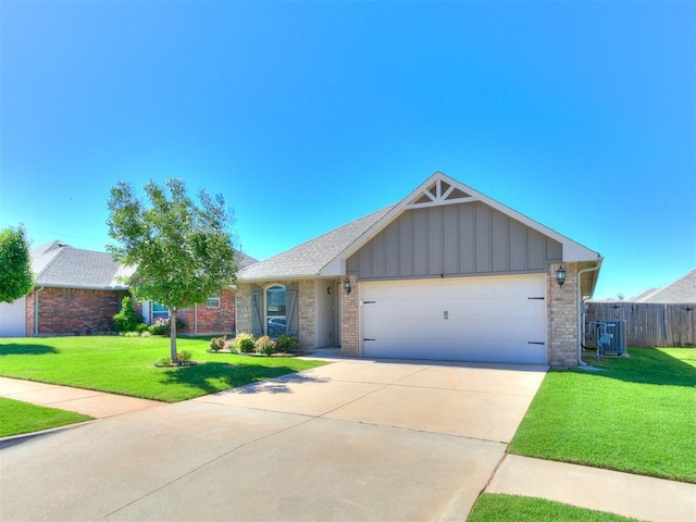 4108 NW 154th St, Edmond, OK 73013 - single story home with board and batten siding, brick siding, concrete driveway, a garage, and central air condition unit
