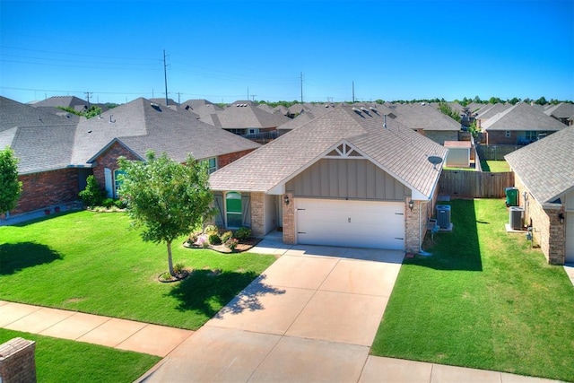 4108 NW 154th St, Edmond, OK 73013 - view of front of house featuring board and batten siding, a residential view, an attached garage, driveway, and cooling unit