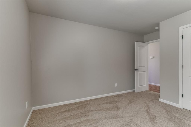 4108 NW 154th St, Edmond, OK 73013 - unfurnished room with light carpet, baseboards, and a smoke detector