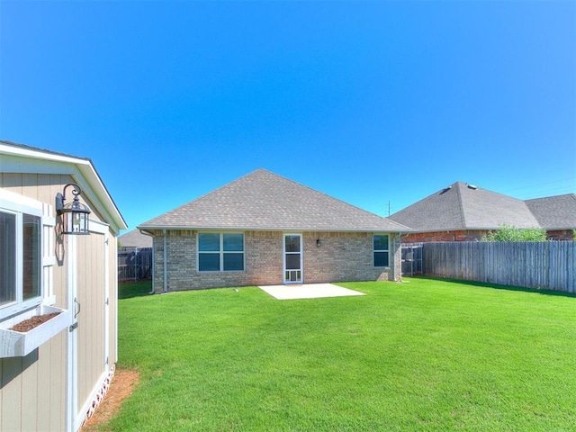 4108 NW 154th St, Edmond, OK 73013 - rear view of property with a patio area, a shingled roof, and brick siding