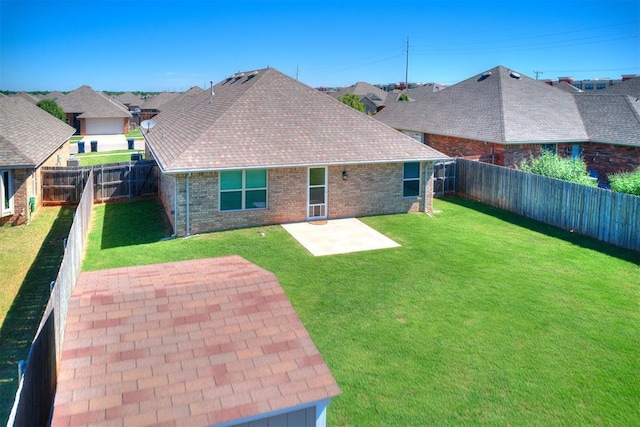 4108 NW 154th St, Edmond, OK 73013 - rear view of property featuring a patio area, brick siding, a shingled roof, and a residential view