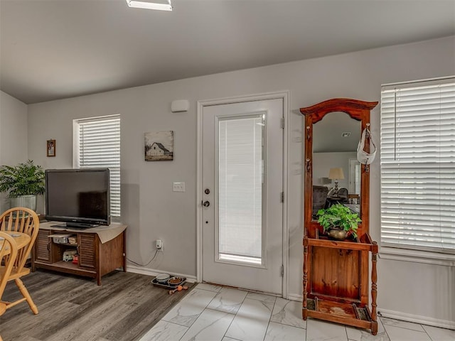 1466 County Rd 1188, Tuttle, OK 73089 - entrance foyer featuring light marble finish flooring and baseboards