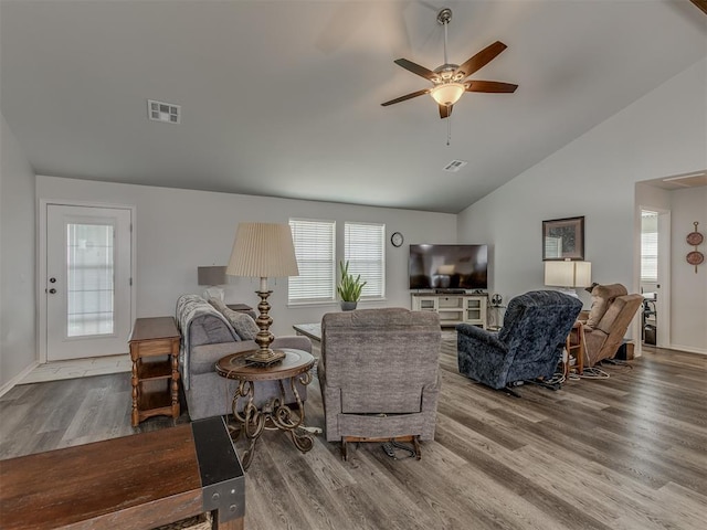 1466 County Rd 1188, Tuttle, OK 73089 - living area with wood finished floors, a ceiling fan, and high vaulted ceiling