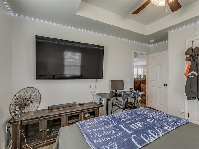 1466 County Rd 1188, Tuttle, OK 73089 - bedroom featuring an office area and a raised ceiling