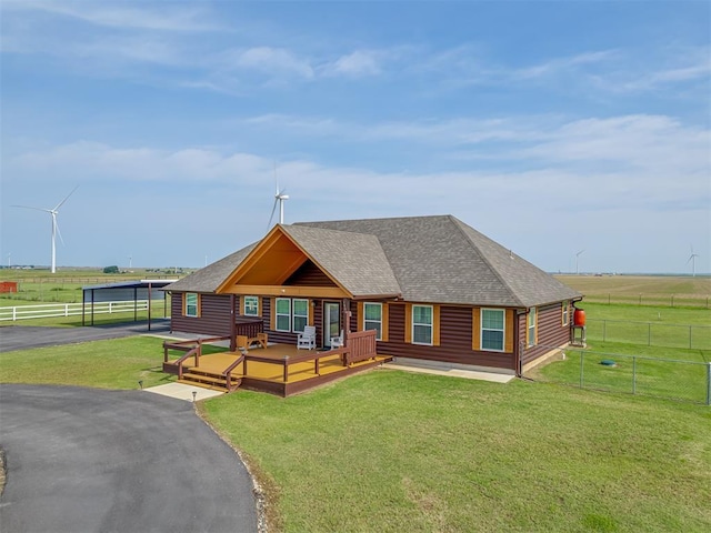 1466 County Rd 1188, Tuttle, OK 73089 - log cabin with asphalt driveway, log veneer siding, roof with shingles, and a view of rural / pastoral area