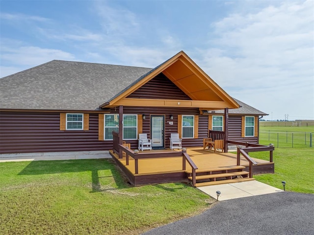 1466 County Rd 1188, Tuttle, OK 73089 - view of front of house with log veneer siding and roof with shingles