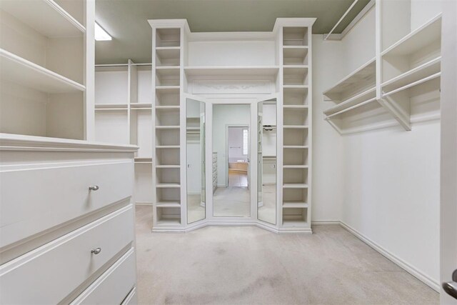 14812 Maplelake Dr, Edmond, OK 73013 - walk in closet with carpet flooring