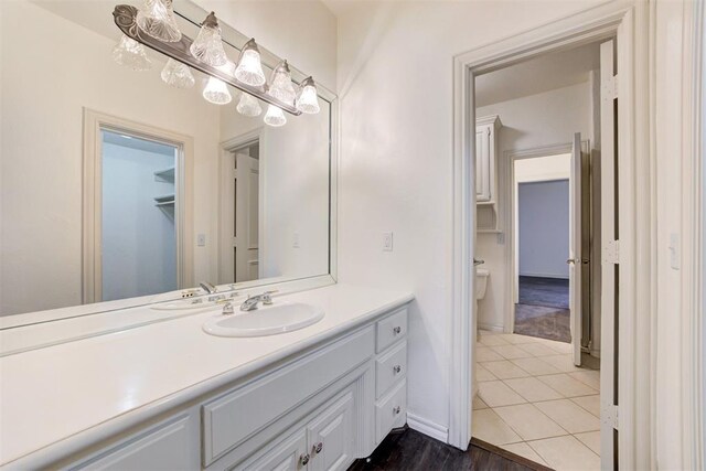 14812 Maplelake Dr, Edmond, OK 73013 - bathroom with vanity, toilet, and tile patterned flooring