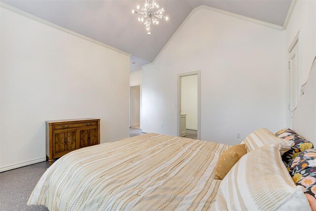 14812 Maplelake Dr, Edmond, OK 73013 - bedroom with high vaulted ceiling, a chandelier, and connected bathroom