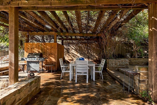 14812 Maplelake Dr, Edmond, OK 73013 - view of patio / terrace featuring outdoor dining space, area for grilling, fence, and a pergola