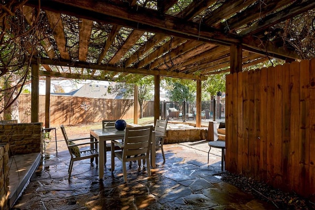 14812 Maplelake Dr, Edmond, OK 73013 - view of patio / terrace featuring outdoor dining space and a fenced backyard