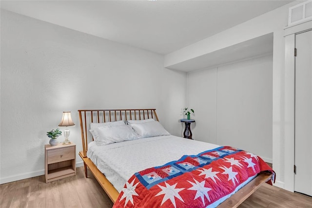 3223 Northridge Dr, Purcell, OK 73080 - bedroom featuring wood finished floors and baseboards