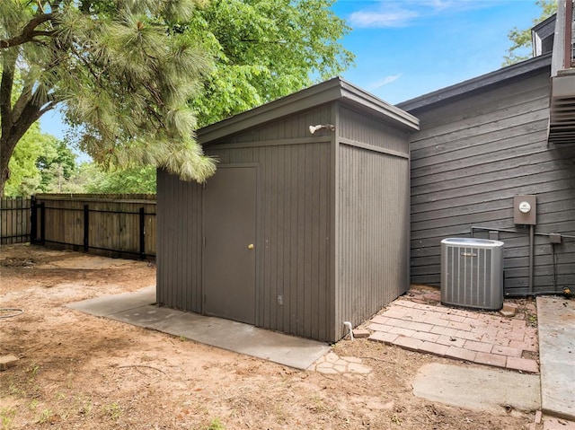 3223 Northridge Dr, Purcell, OK 73080 - view of shed with fence and central AC