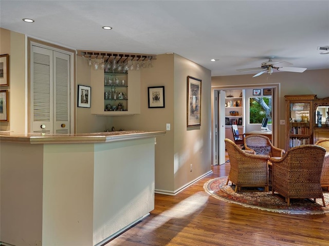 2901 NE 122nd St, Edmond, OK 73013 - dining room featuring wet bar, wood finished floors, recessed lighting, ceiling fan, and baseboards