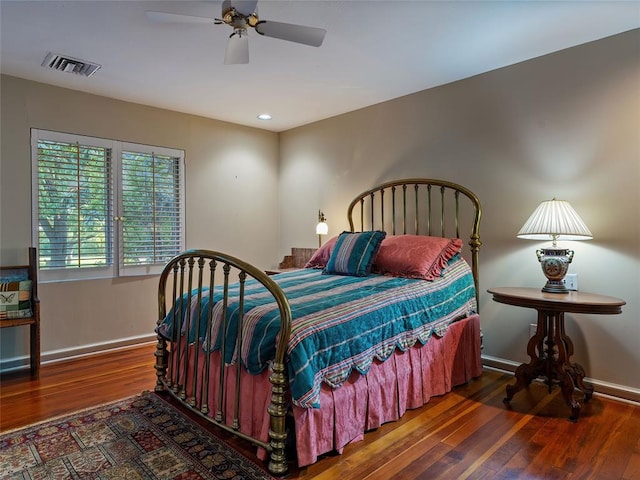 2901 NE 122nd St, Edmond, OK 73013 - bedroom with wood finished floors, baseboards, ceiling fan, and recessed lighting