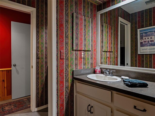 2901 NE 122nd St, Edmond, OK 73013 - bathroom with wallpapered walls and vanity