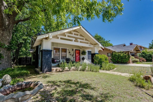 1217 NW 44th St, Oklahoma City, OK 73118 - craftsman-style house with brick siding