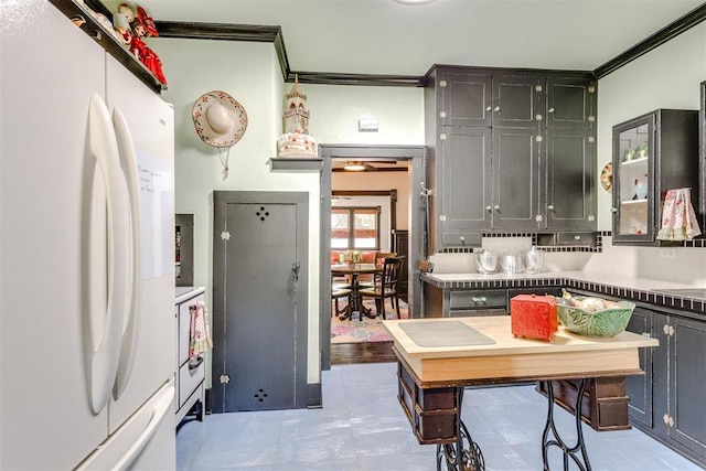1217 NW 44th St, Oklahoma City, OK 73118 - kitchen featuring freestanding refrigerator