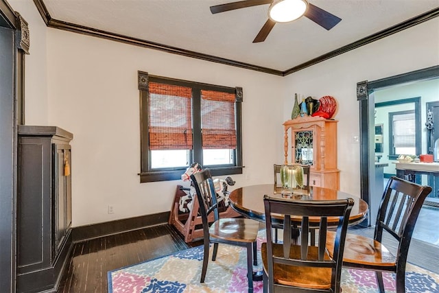 1217 NW 44th St, Oklahoma City, OK 73118 - dining space featuring hardwood / wood-style floors, ornamental molding, a ceiling fan, and baseboards