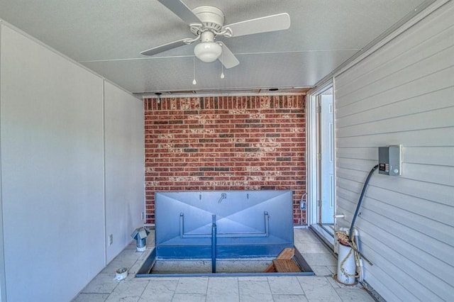 4419 SE 57th St, Del City, OK 73135 - detailed view of ceiling fan and brick siding