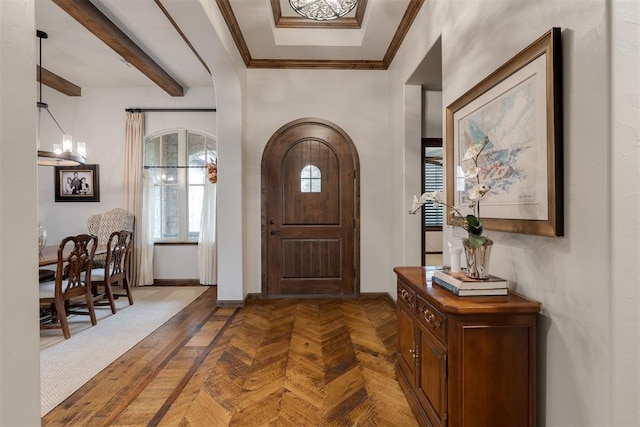 7616 NW 134th St, Oklahoma City, OK 73142 - entryway with baseboards, arched walkways, beam ceiling, and ornamental molding