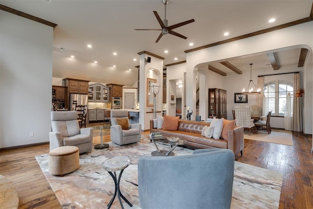 7616 NW 134th St, Oklahoma City, OK 73142 - living room featuring a ceiling fan, light wood-type flooring, recessed lighting, a chandelier, and baseboards