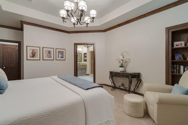 7616 NW 134th St, Oklahoma City, OK 73142 - bedroom with carpet, a chandelier, a tray ceiling, ornamental molding, and ensuite bath